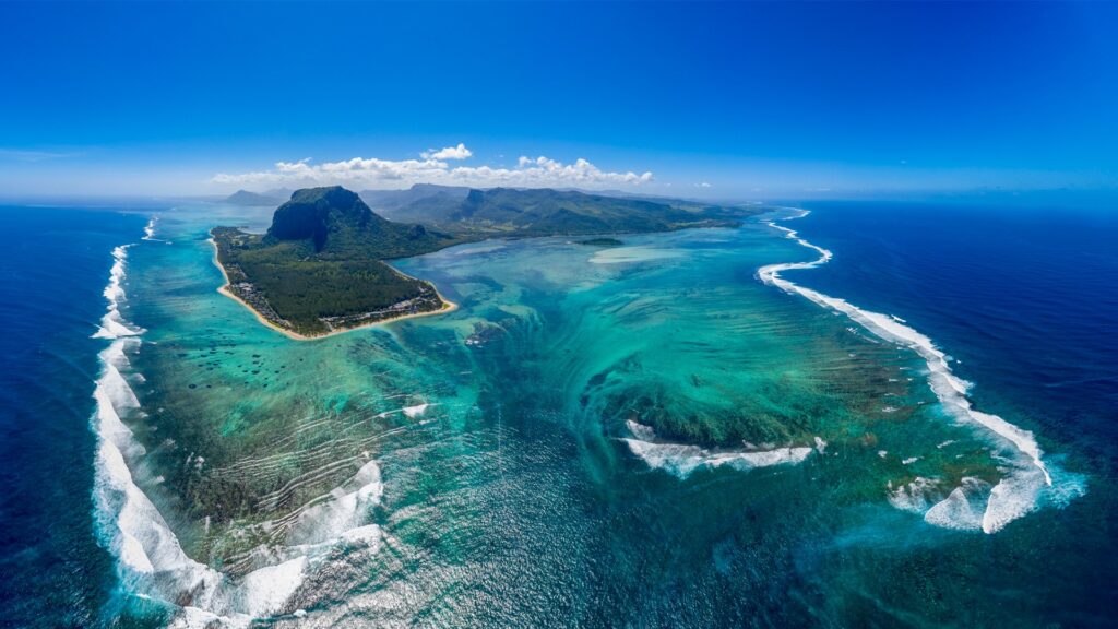 Mauritius tropical beach with turquoise lagoon and palm trees