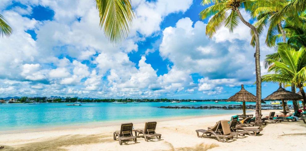 White-sand beach and turquoise lagoon on the coast of Mauritius