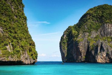 Tropical beach and limestone cliffs in Krabi Thailand